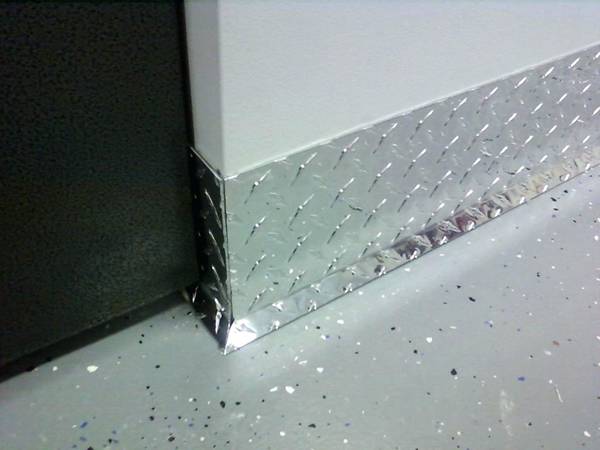 Diamond plate baseboard installed in the bottom position of wall